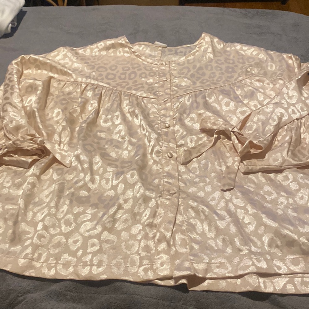 Silk cheetah blouse with bows on sleeves. Tags still attached